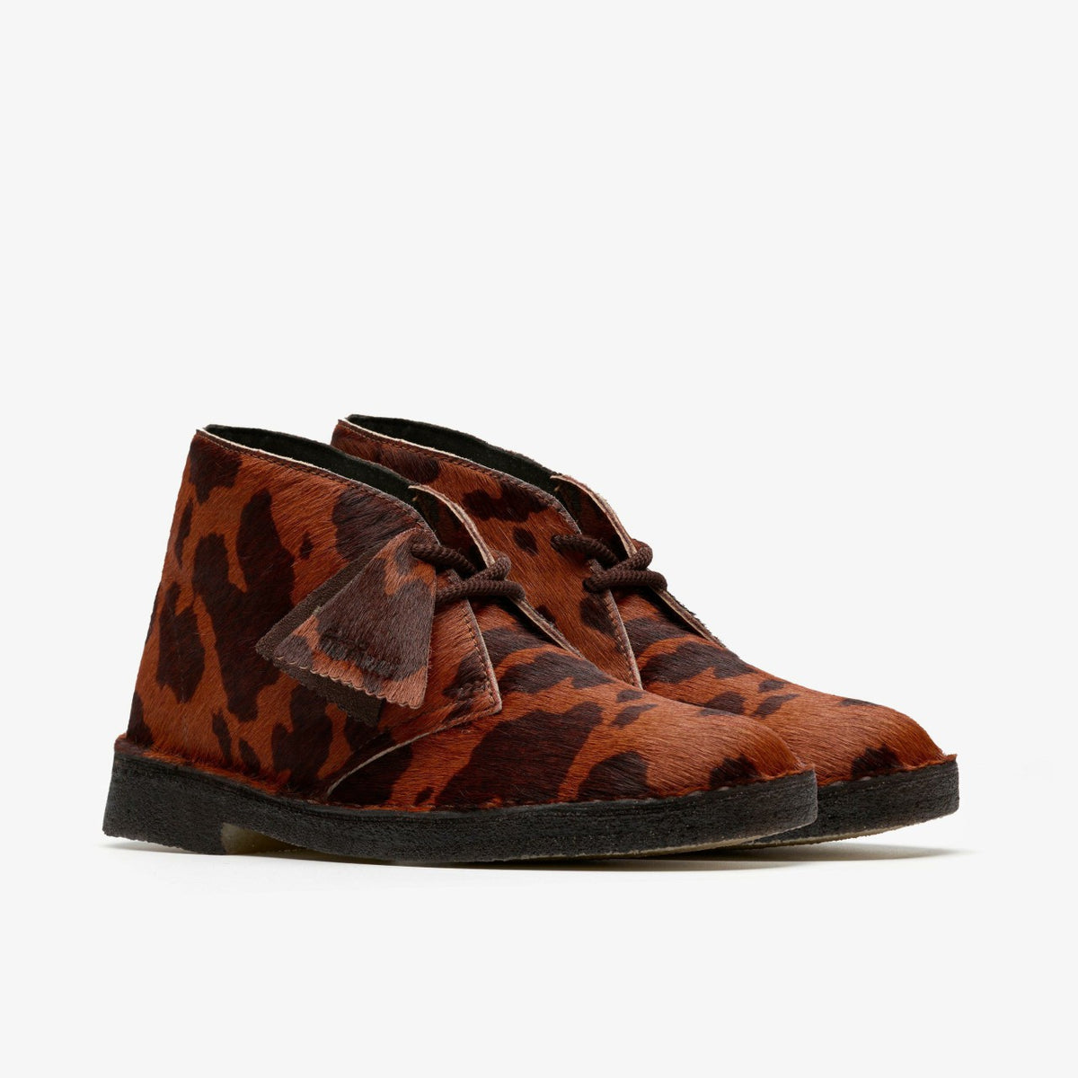 Clarks Women Desert Boot. Brown Cow Print