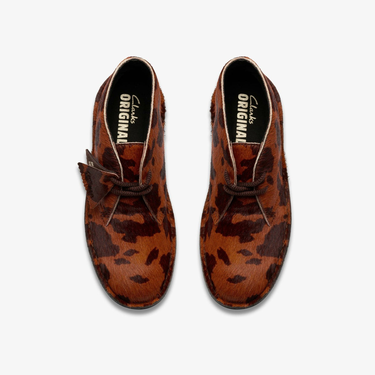Clarks Women Desert Boot. Brown Cow Print